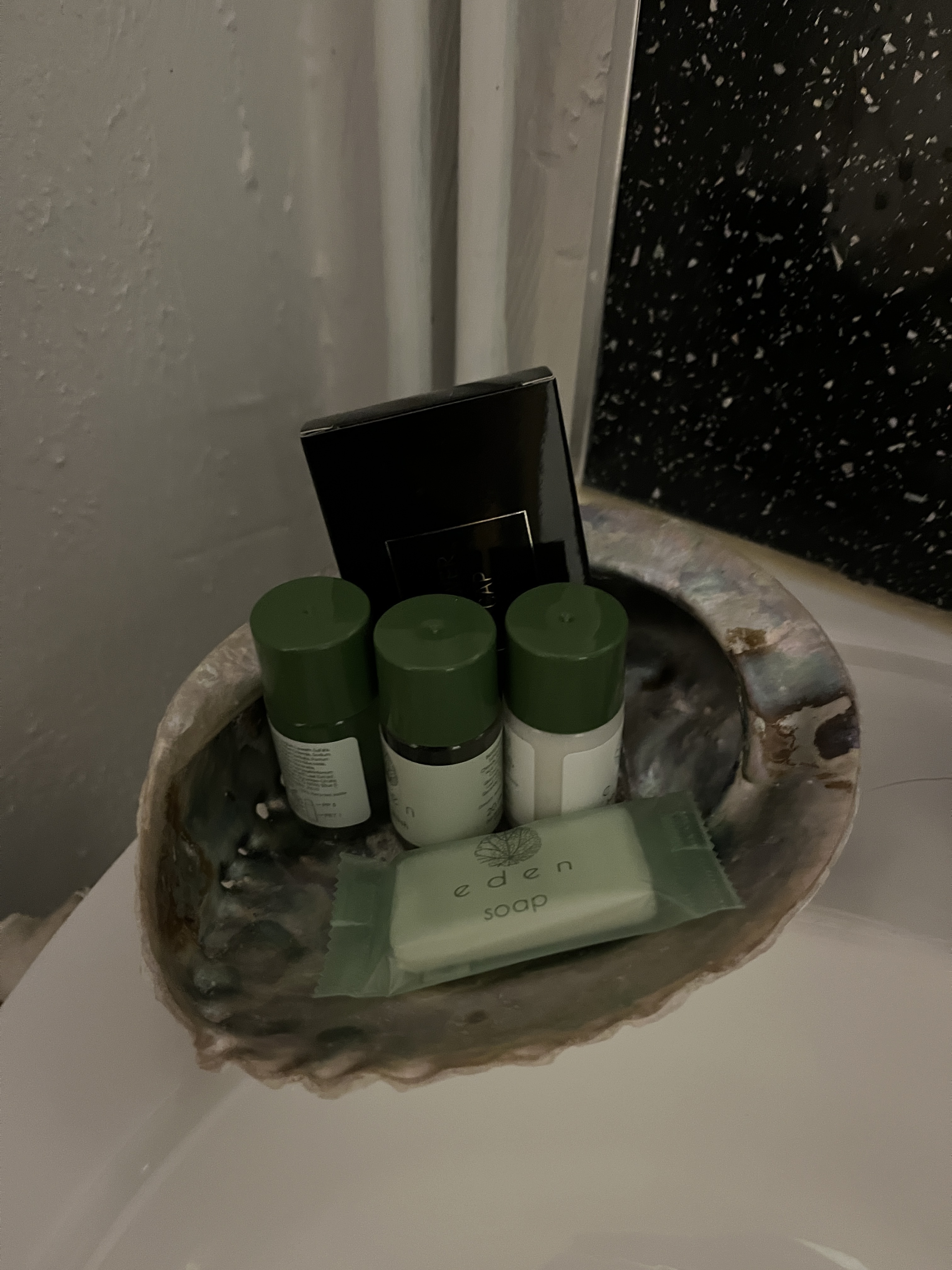 Complimentary toiletries in an abalone shell